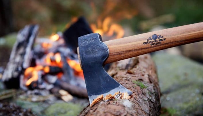 cleaning up limbs with a camp axe